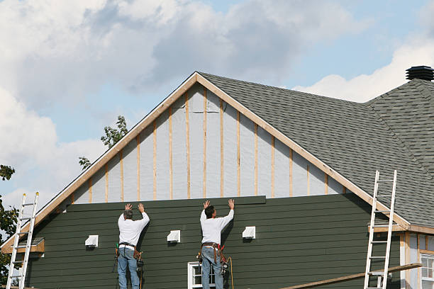 Professional Storm Damage Siding Repair technician working in Strasburg, PA
